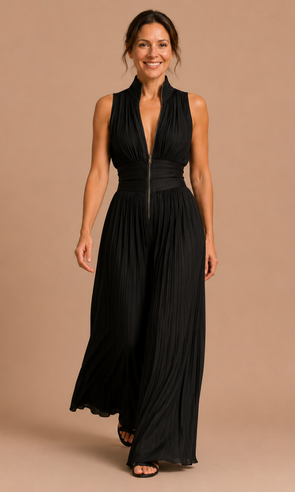 A model in the white women's jumpsuit, captured in natural light, perfect for warm weather styling.