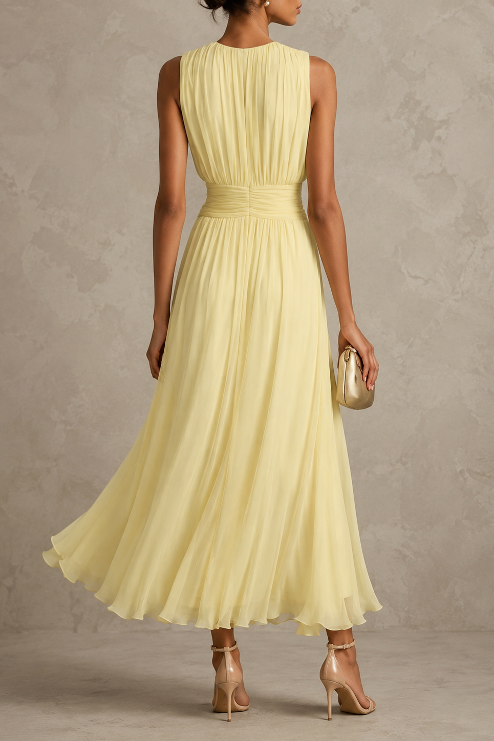 Back view of the pink maxi dress, emphasizing the graceful drape of the breathable chiffon fabric.