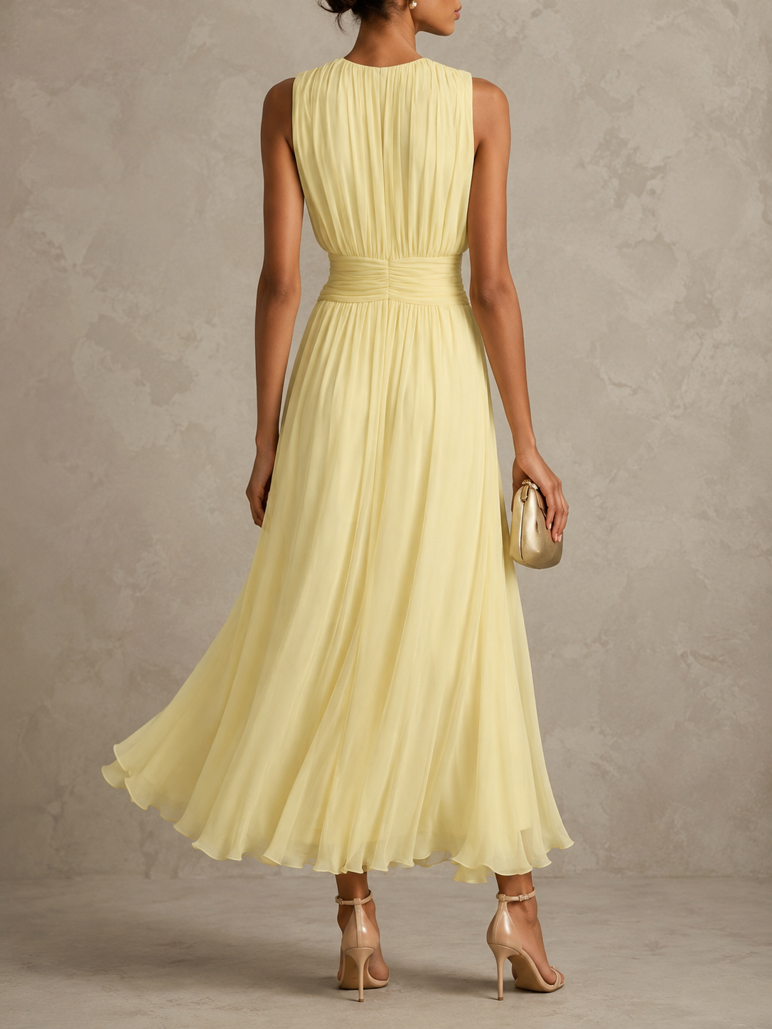 Back view of the pink maxi dress, emphasizing the graceful drape of the breathable chiffon fabric.