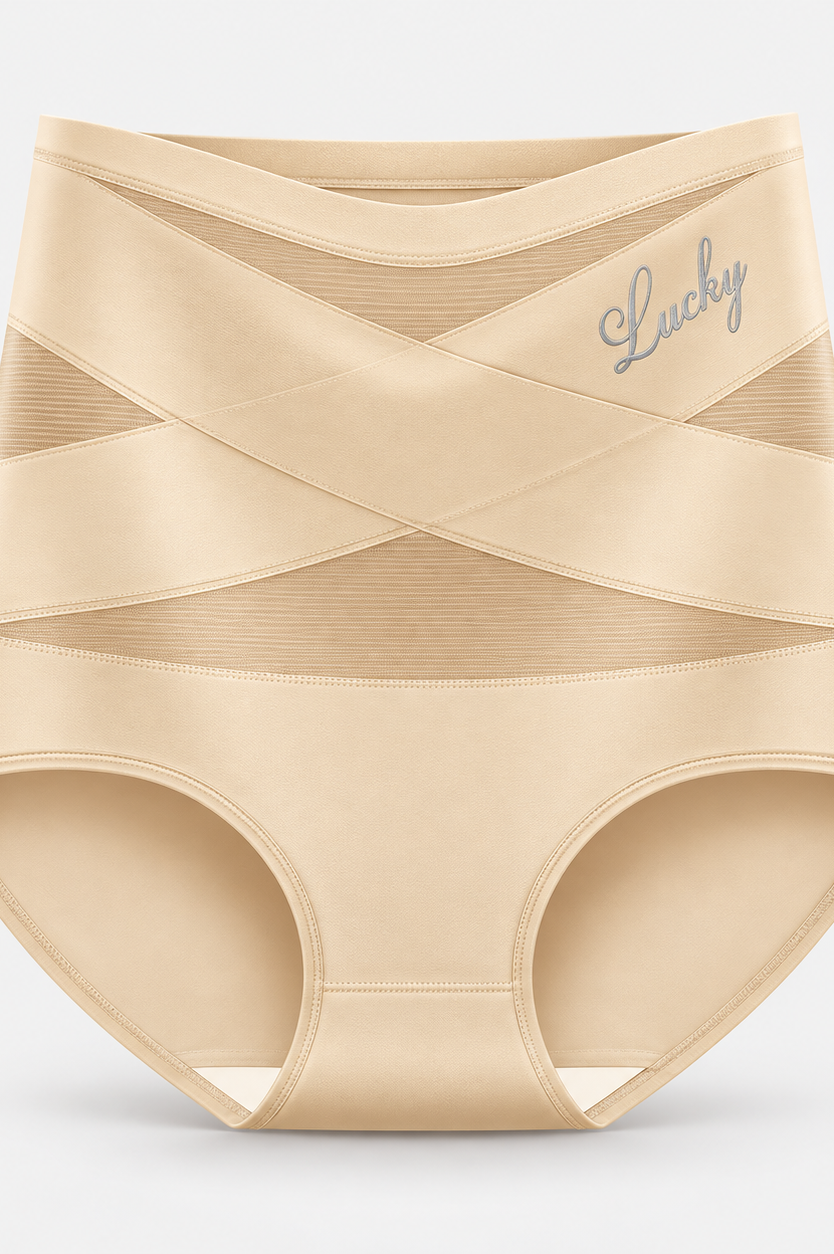 Hand holding the soft, stretchable fabric of the shaping underwear to show its texture.