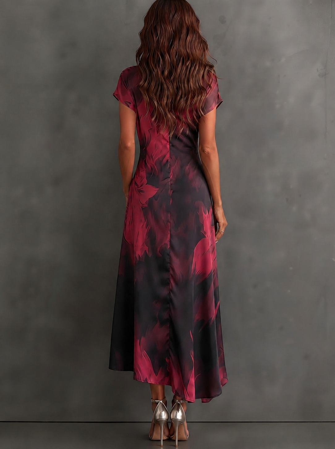 Close-up of the fabric on a purple abstract maxi dress, showing the matte milk silk finish and print texture.
