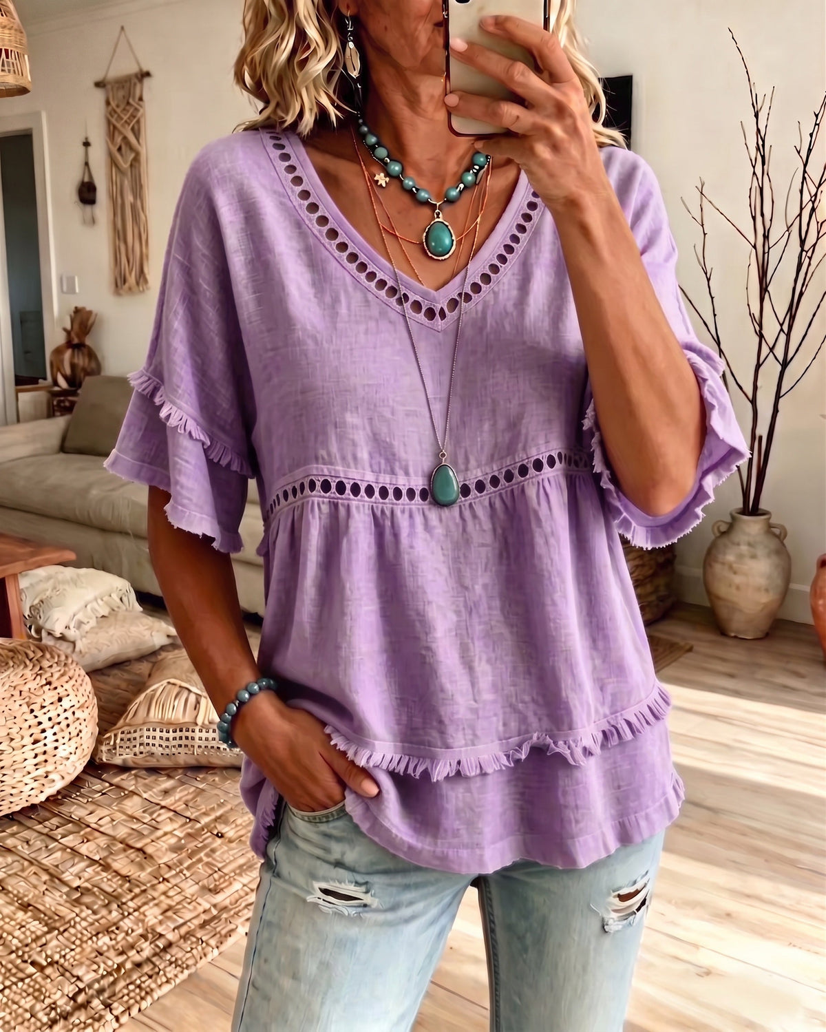 Flat lay of the Khaki Elowyn blouse, displaying its relaxed everyday fit and versatile styling potential.