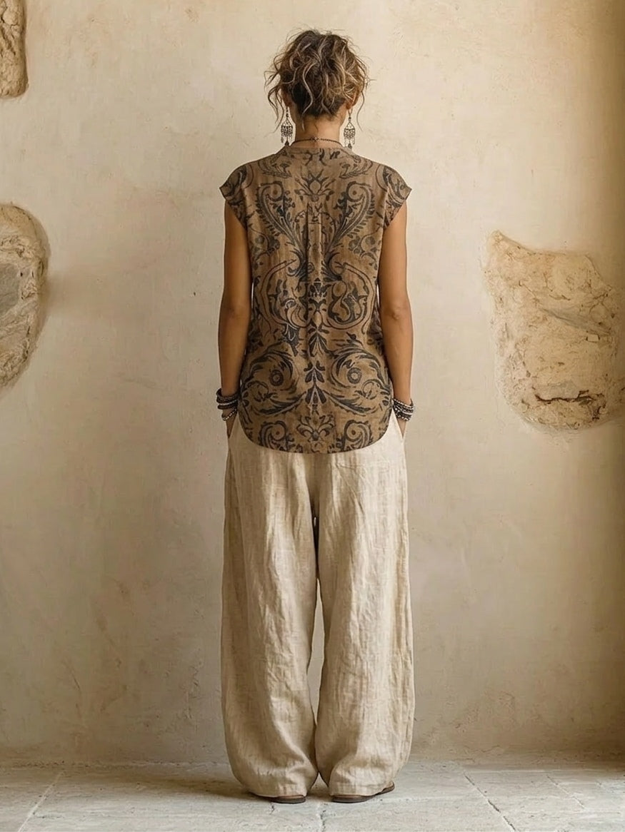Side profile of a woman posing in versatile brown wide-leg trousers, highlighting their elegant drape.