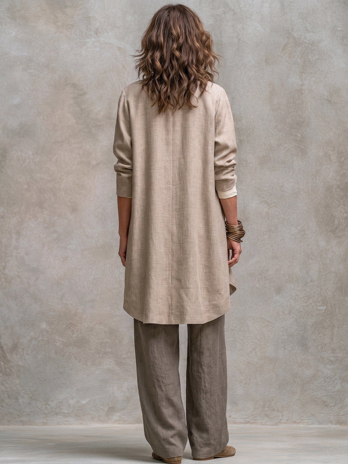 Model posing casually in the comfortable open-front jacket, demonstrating its ease of wear and modern appeal.