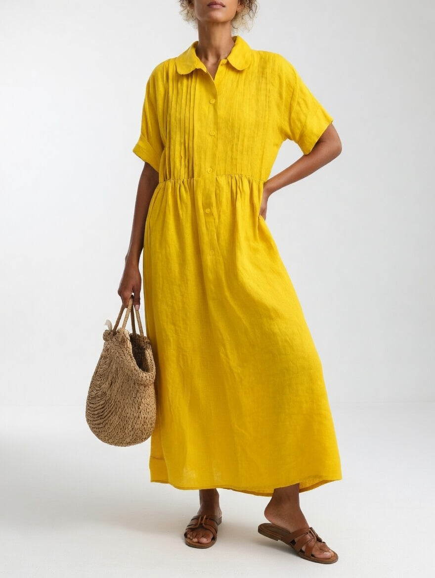 A red long shirt dress styled for a vacation setting, illustrating its versatility and breathable fabric.