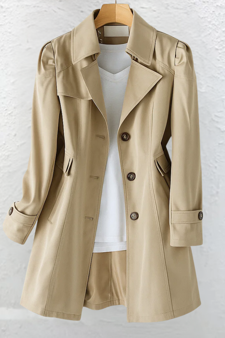 Back view of the Adeline elegant summer trench coat, revealing the smooth drape and classic design details.