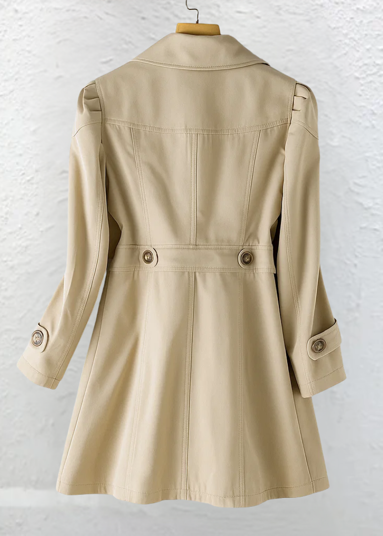 Detailed shot of the adjustable cuff and sleeve design on the Adeline elegant summer trench coat.