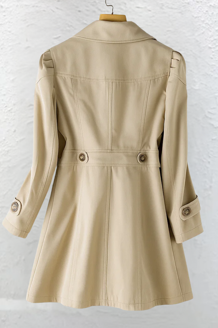Detailed shot of the adjustable cuff and sleeve design on the Adeline elegant summer trench coat.