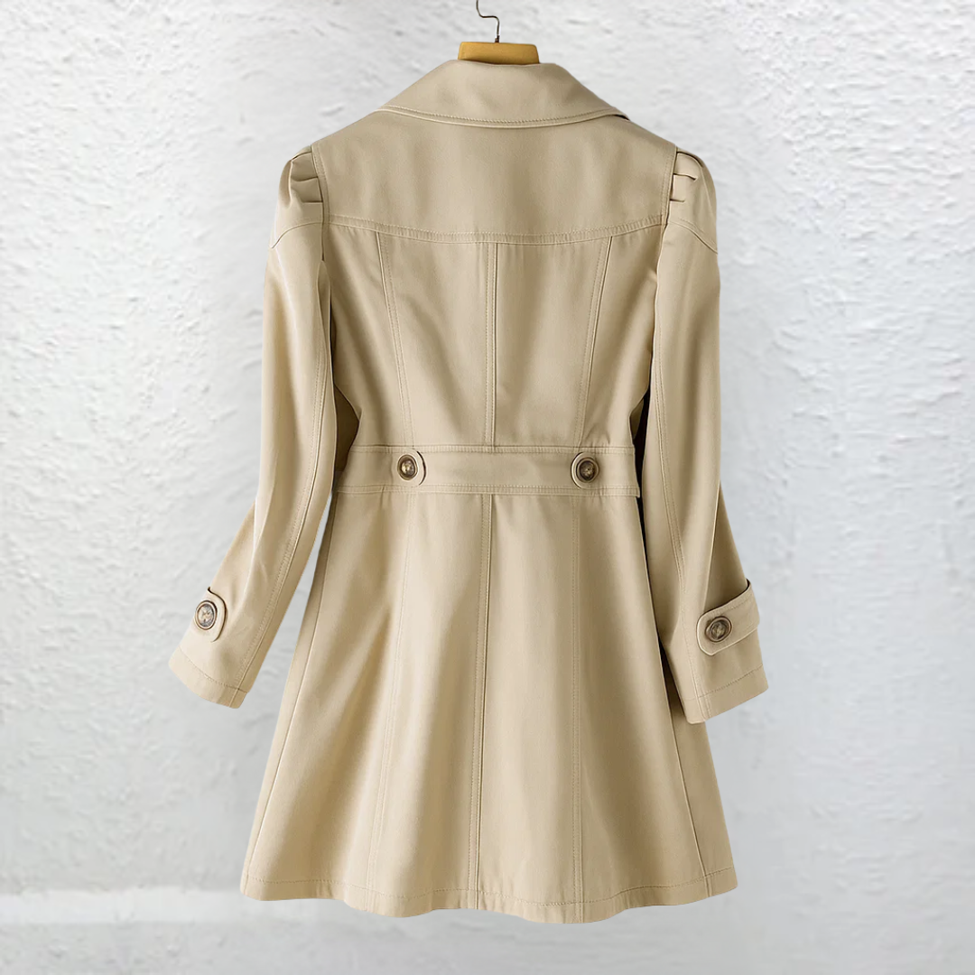 Detailed shot of the adjustable cuff and sleeve design on the Adeline elegant summer trench coat.