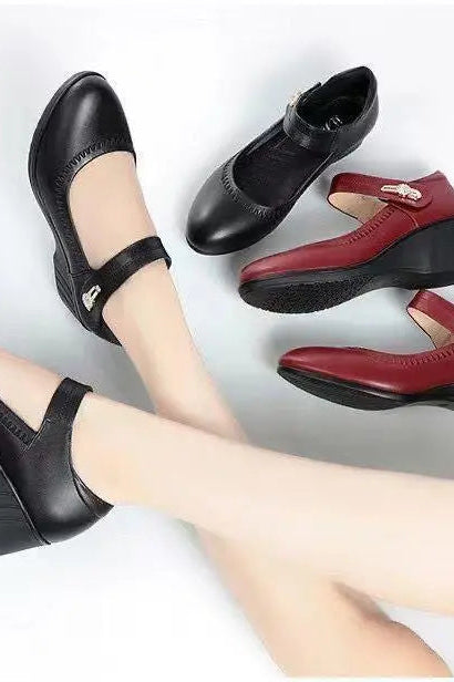 Back view of the black Alana mid-heel comfort shoes, highlighting the stable heel and overall elegant silhouette.