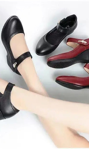 Back view of the black Alana mid-heel comfort shoes, highlighting the stable heel and overall elegant silhouette.