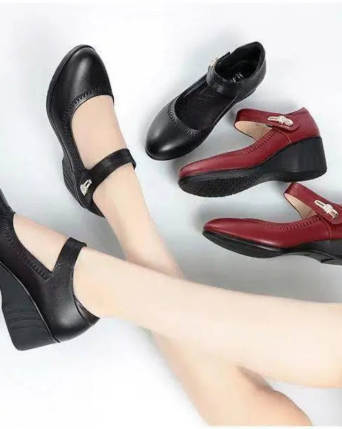Back view of the black Alana mid-heel comfort shoes, highlighting the stable heel and overall elegant silhouette.