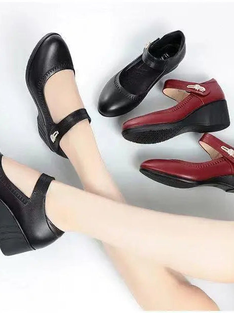 Back view of the black Alana mid-heel comfort shoes, highlighting the stable heel and overall elegant silhouette.