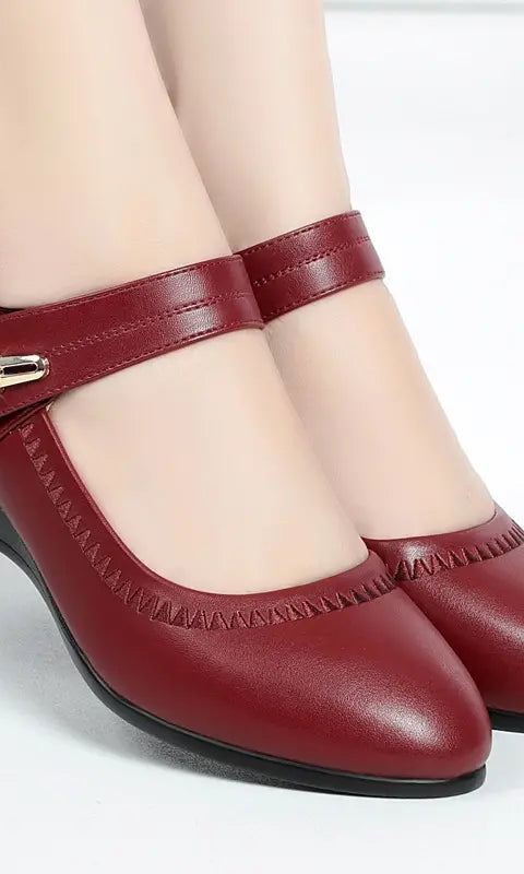 Close-up of the adjustable strap and buckle on the Alana shoes, showing the customizable fit feature.