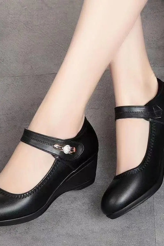 A pair of Alana mid-heel comfort shoes in beige, styled casually to show their versatility for various outfits.