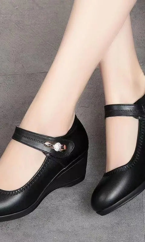 A pair of Alana mid-heel comfort shoes in beige, styled casually to show their versatility for various outfits.