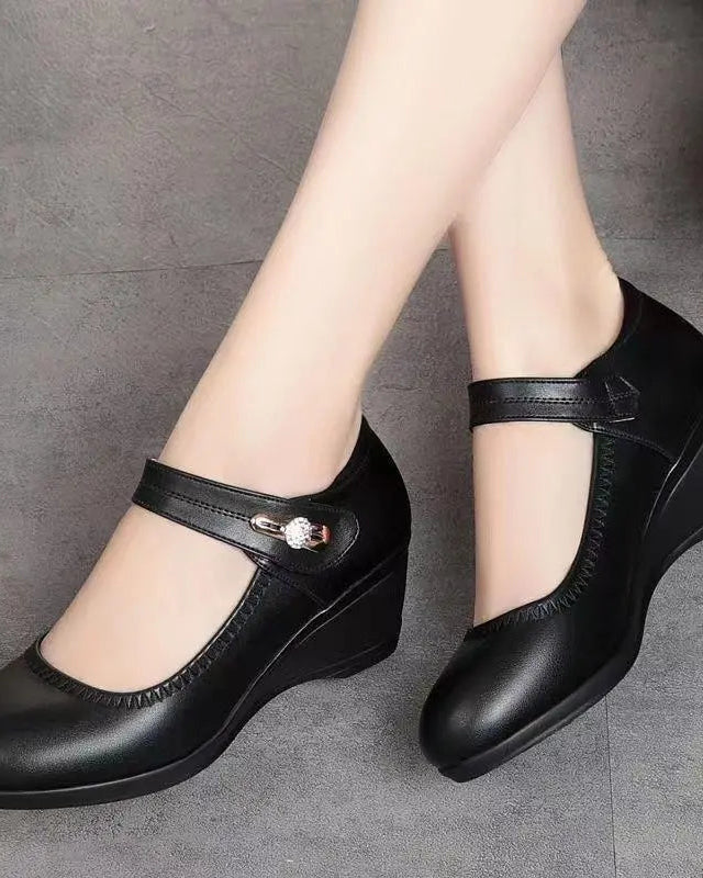 A pair of Alana mid-heel comfort shoes in beige, styled casually to show their versatility for various outfits.