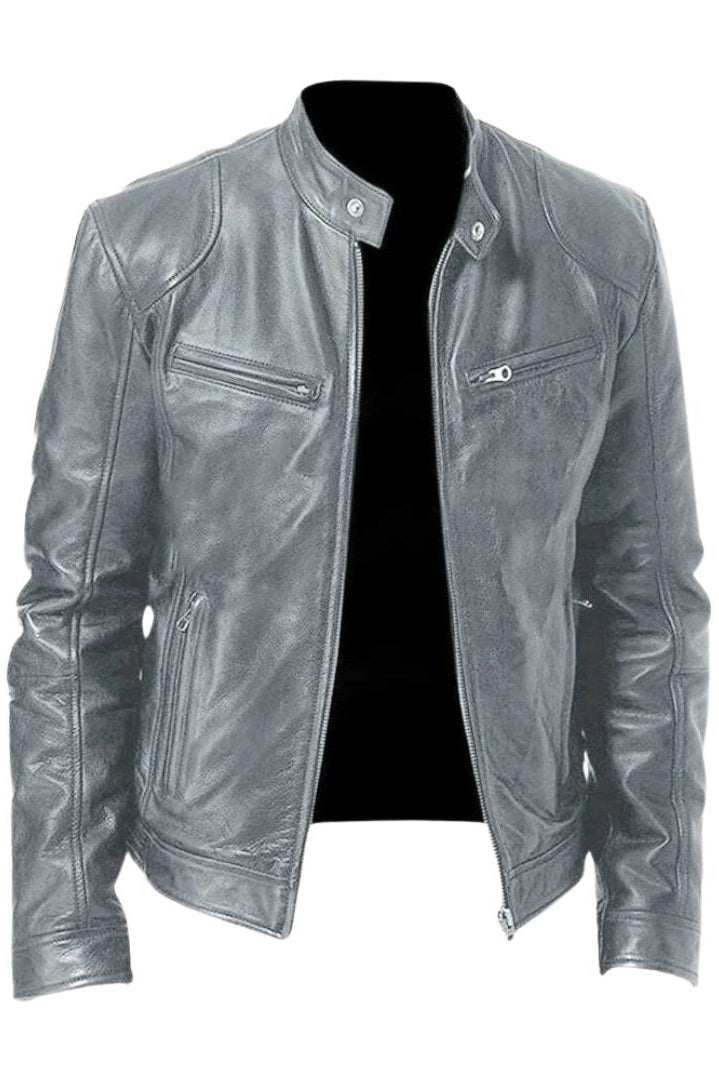 A model wearing the navy blue Alden leather jacket, captured in motion to show its comfortable fit.