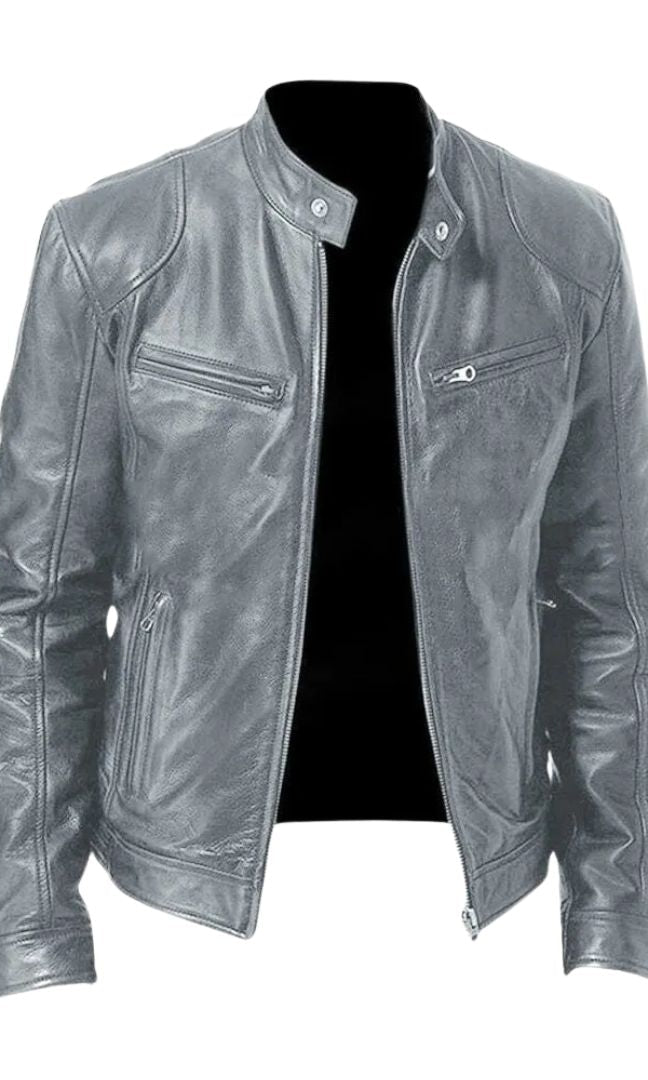 A model wearing the navy blue Alden leather jacket, captured in motion to show its comfortable fit.