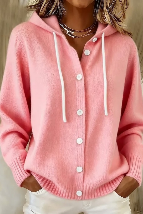 Front view of a pink Anouk T-shirt on a model, showcasing its loose fit and comfortable design.