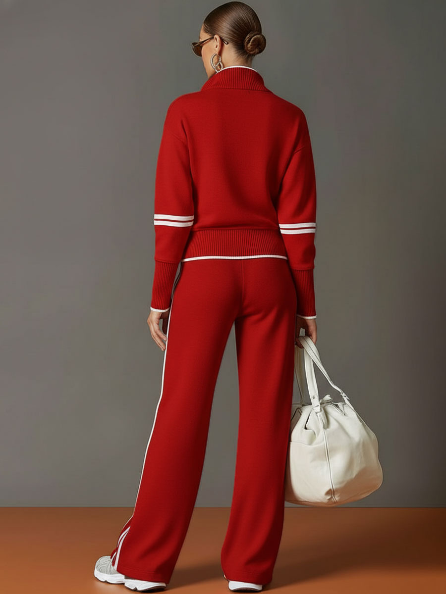 Woman showcasing the stretch and flexibility of the Anouk relaxed fit pants with a subtle movement.