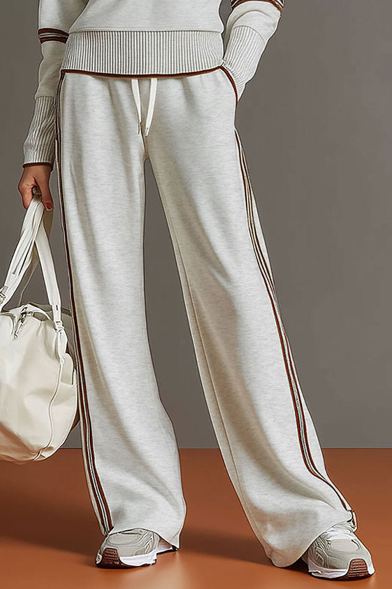 Anouk relaxed fit pants paired with casual footwear, demonstrating versatile styling options.