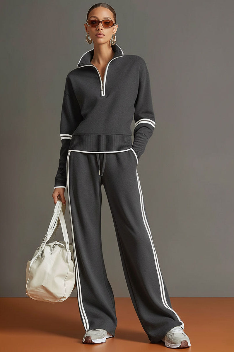 Side view of a woman wearing Anouk relaxed fit pants, showing the comfortable waistband and natural fall.