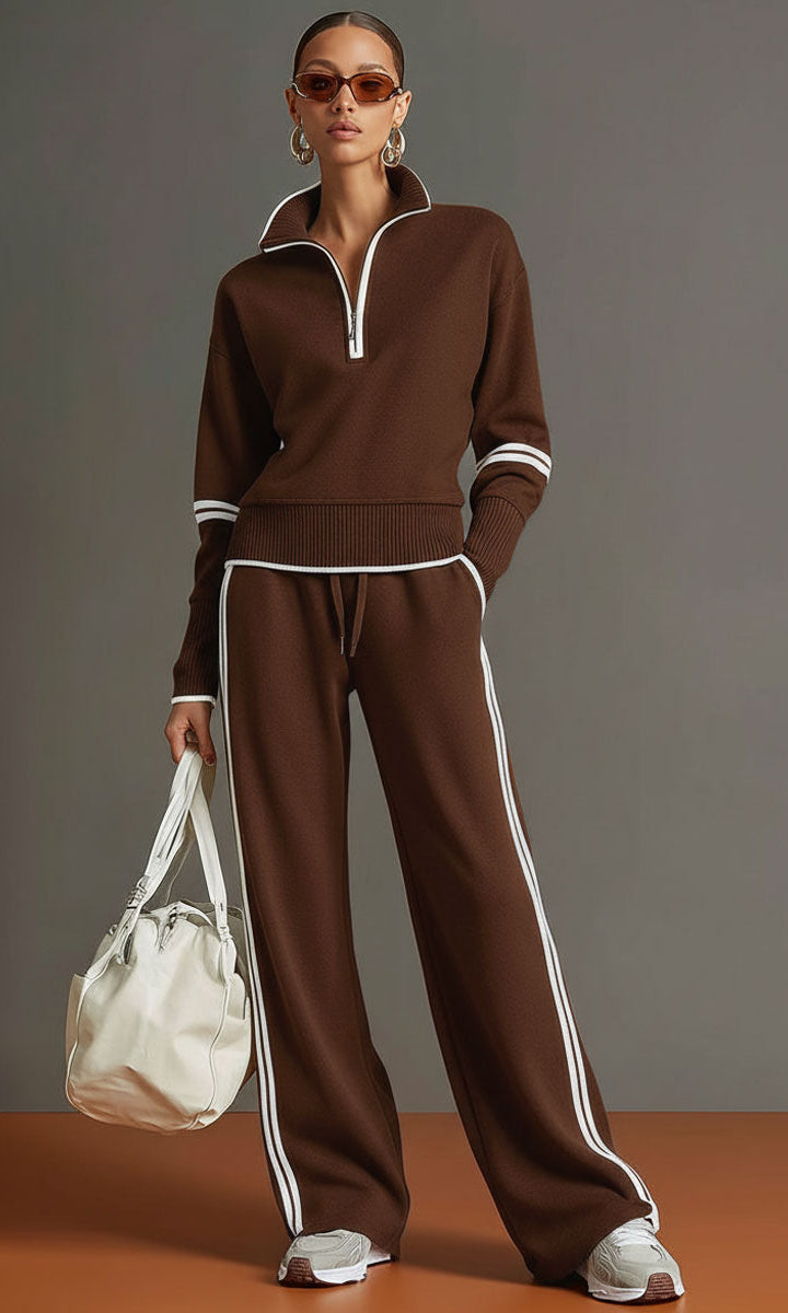 Woman walking outdoors in Anouk relaxed fit pants, illustrating the versatility for active yet comfortable wear.