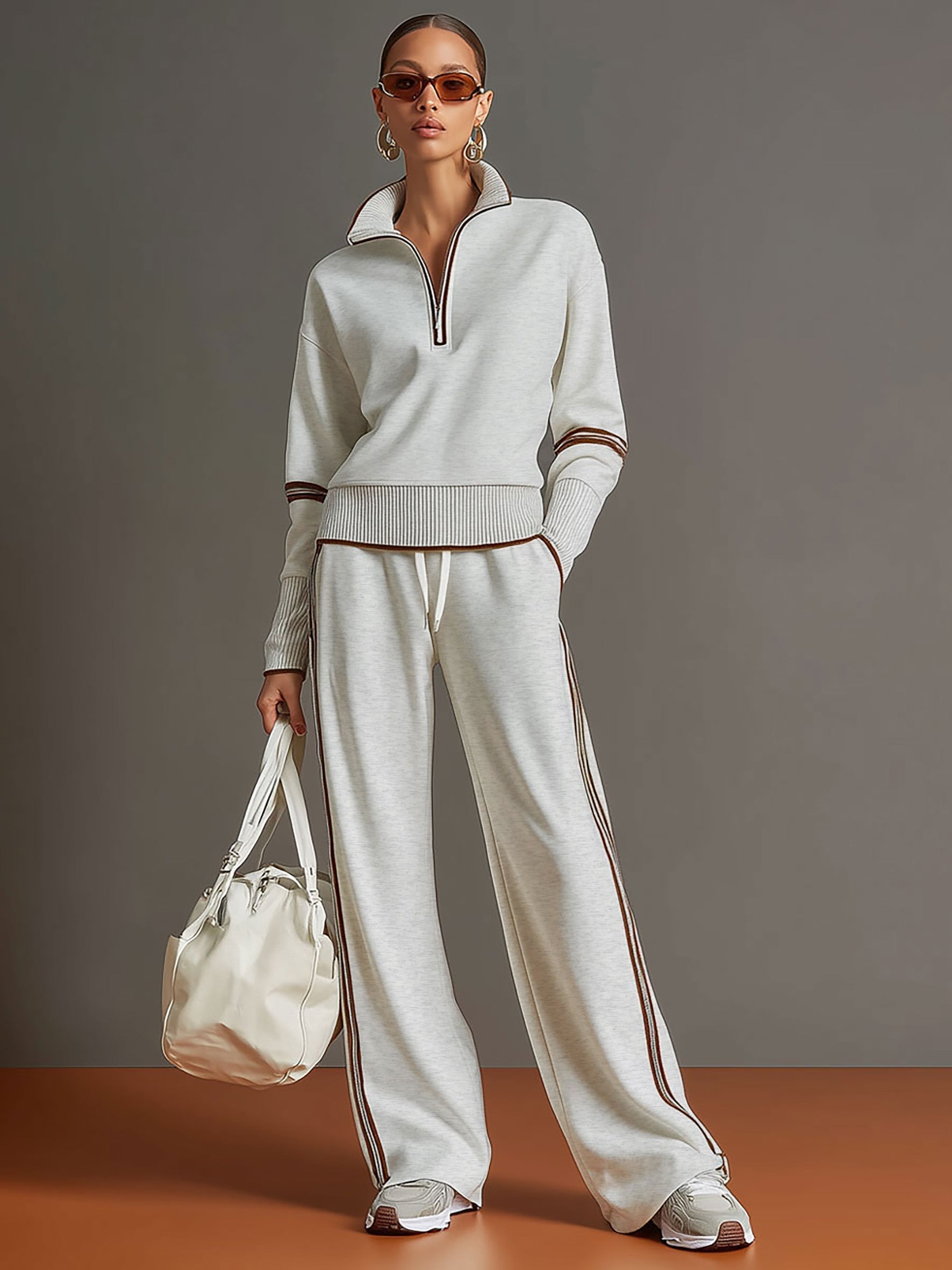 Back view of the Anouk relaxed fit pants on a woman, highlighting the smooth lines and flattering shape.