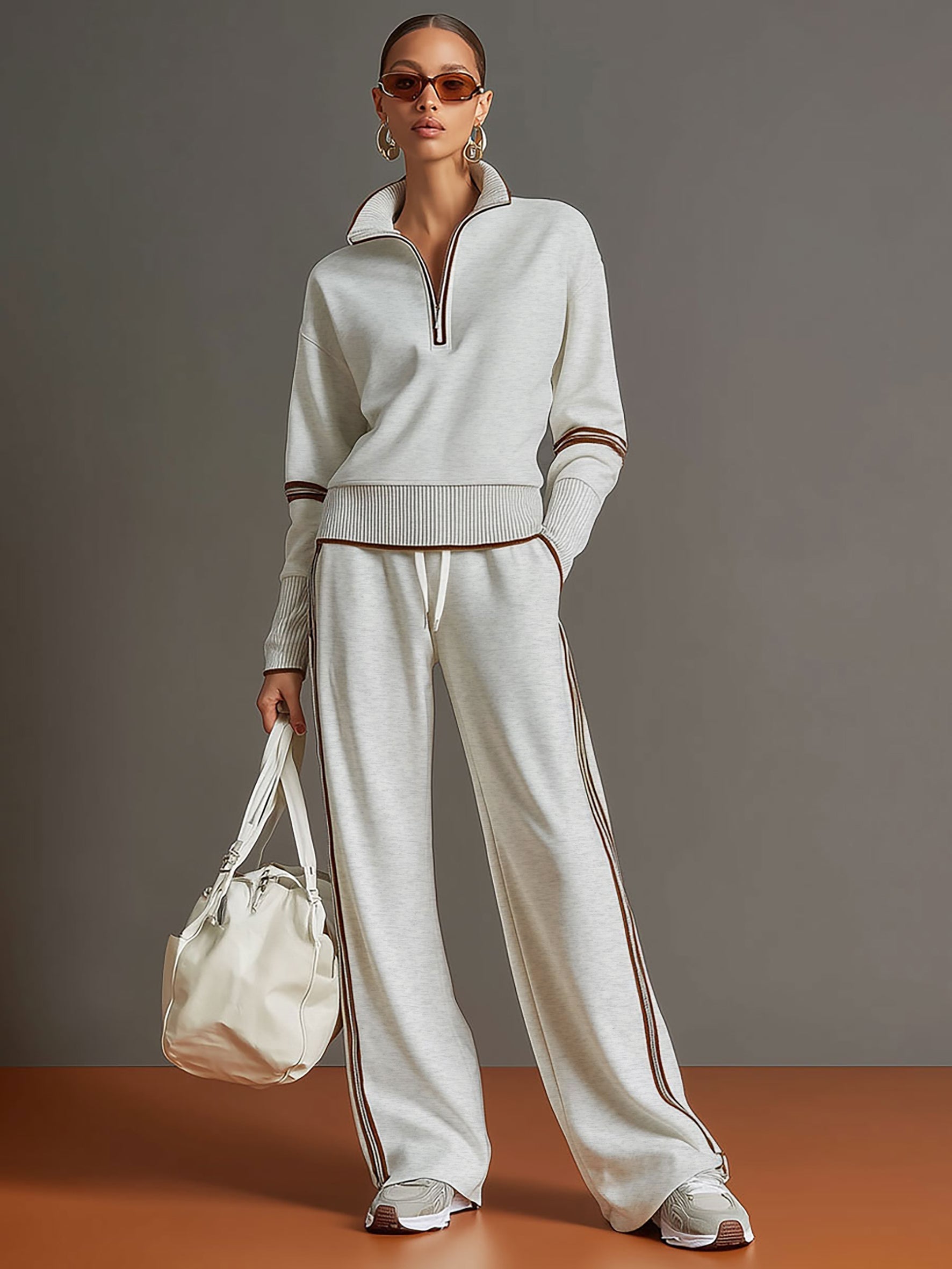 Back view of the Anouk relaxed fit pants on a woman, highlighting the smooth lines and flattering shape.