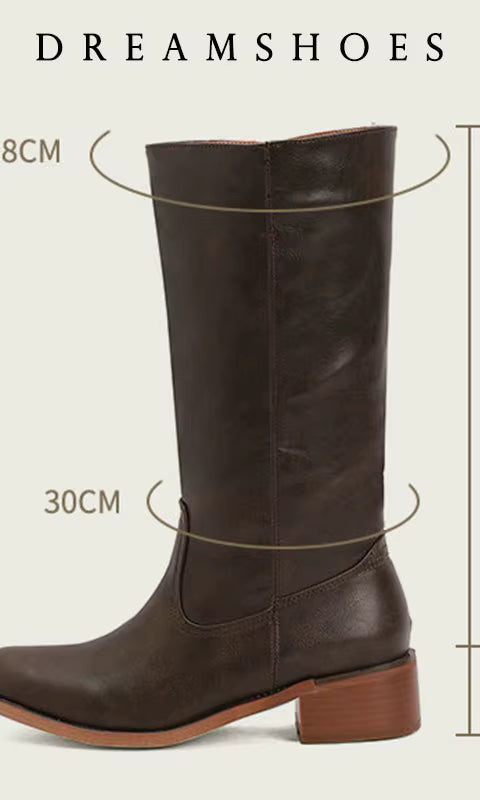 Detail shot of the toe design on the dark brown Calandra classic western boots, emphasizing craftsmanship.