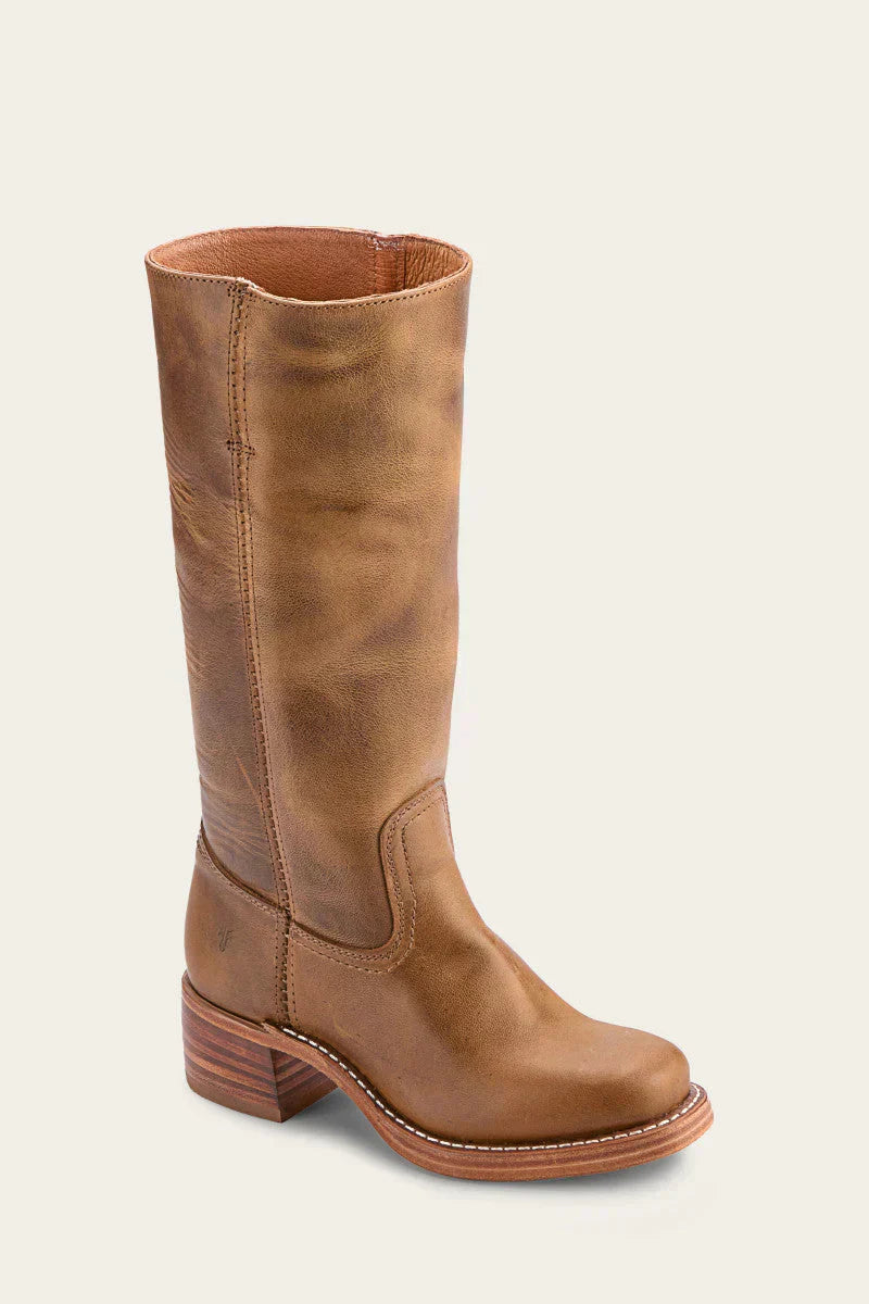 Close-up detail of the traditional stitching on the shaft of the brown Calandra classic western boots.