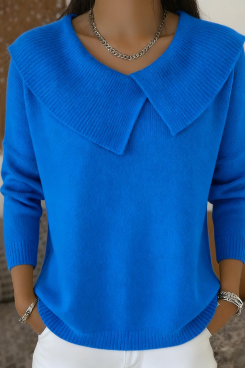 Rear view of the deep blue wool blend pants, showing the flattering fit and fabric flow.