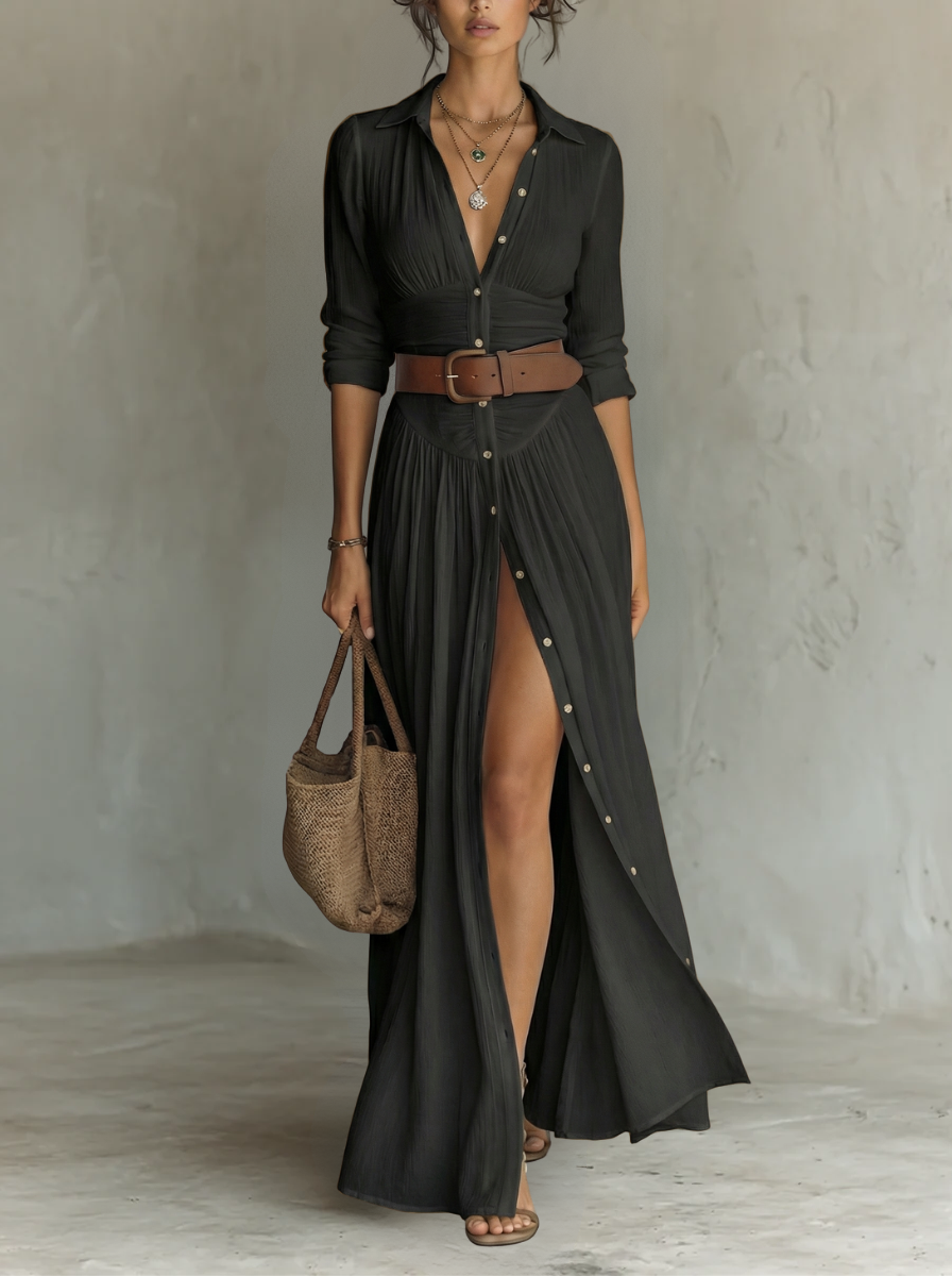 Rear view of the black Seraphina linen blend maxi dress, emphasizing the drape and length of the garment.