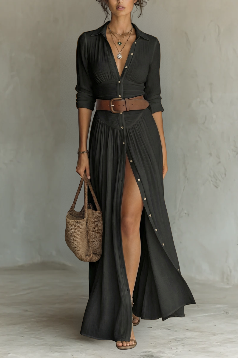 Rear view of the black Seraphina linen blend maxi dress, emphasizing the drape and length of the garment.