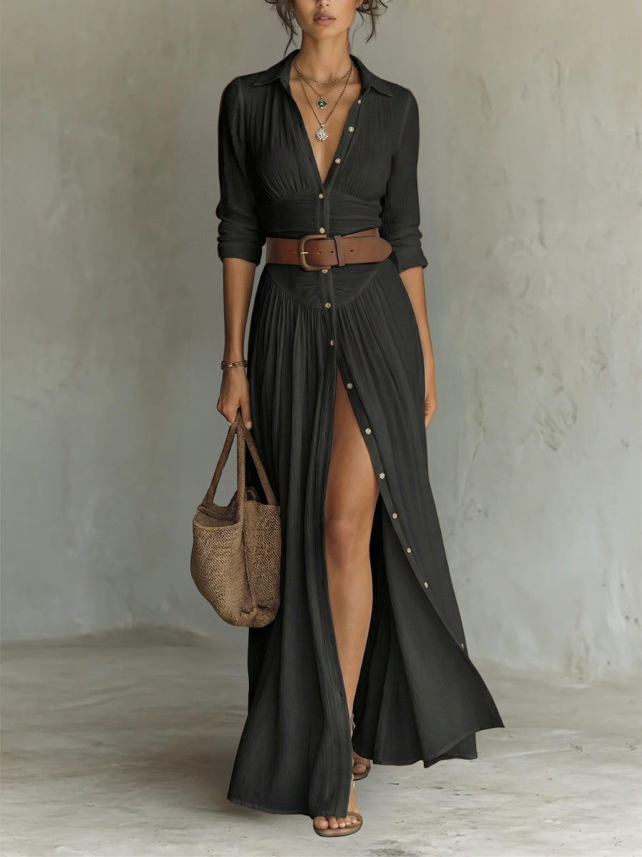 Rear view of the black Seraphina linen blend maxi dress, emphasizing the drape and length of the garment.