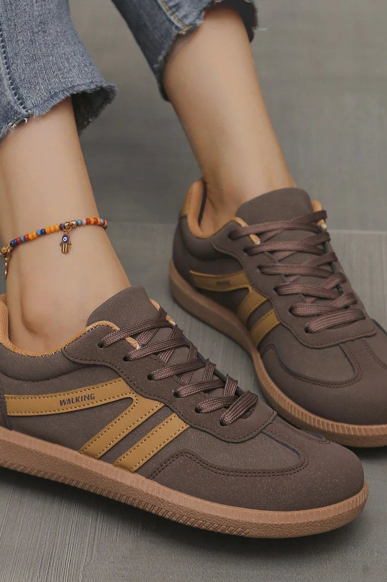 Close-up of the heel support on a wine red Elara orthopaedic cushioned trainer, illustrating its orthopaedic benefits.