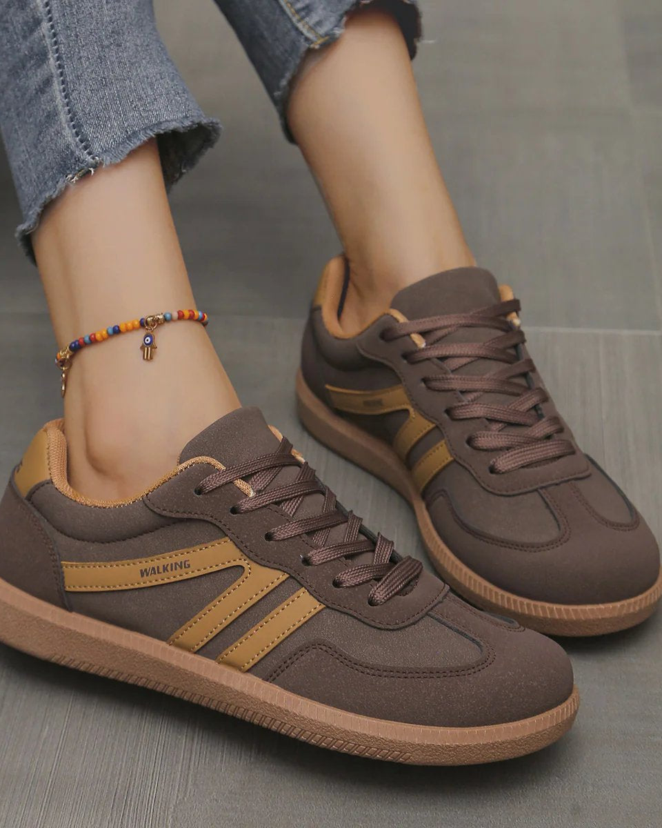Side view of a khaki Elara orthopaedic cushioned trainer, highlighting its earthy tone and robust construction.