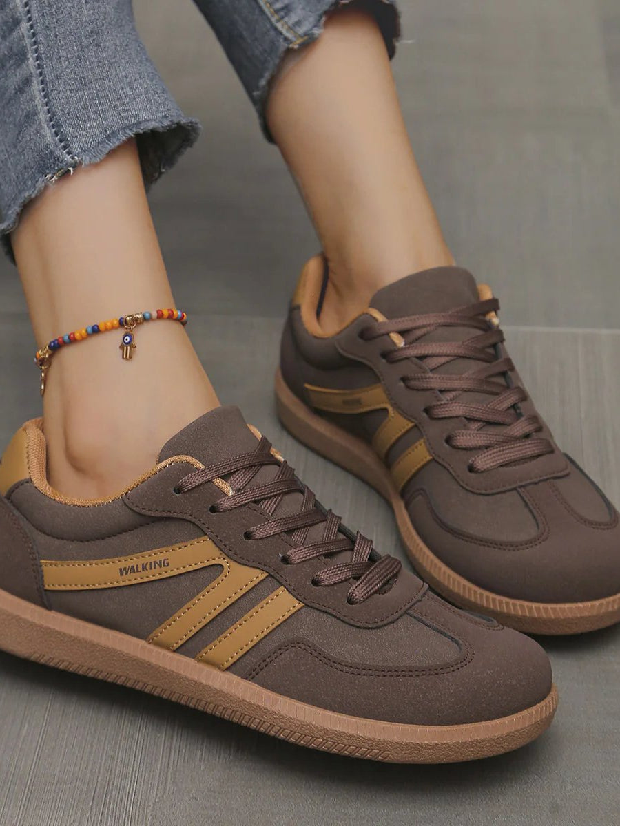 Side view of a khaki Elara orthopaedic cushioned trainer, highlighting its earthy tone and robust construction.