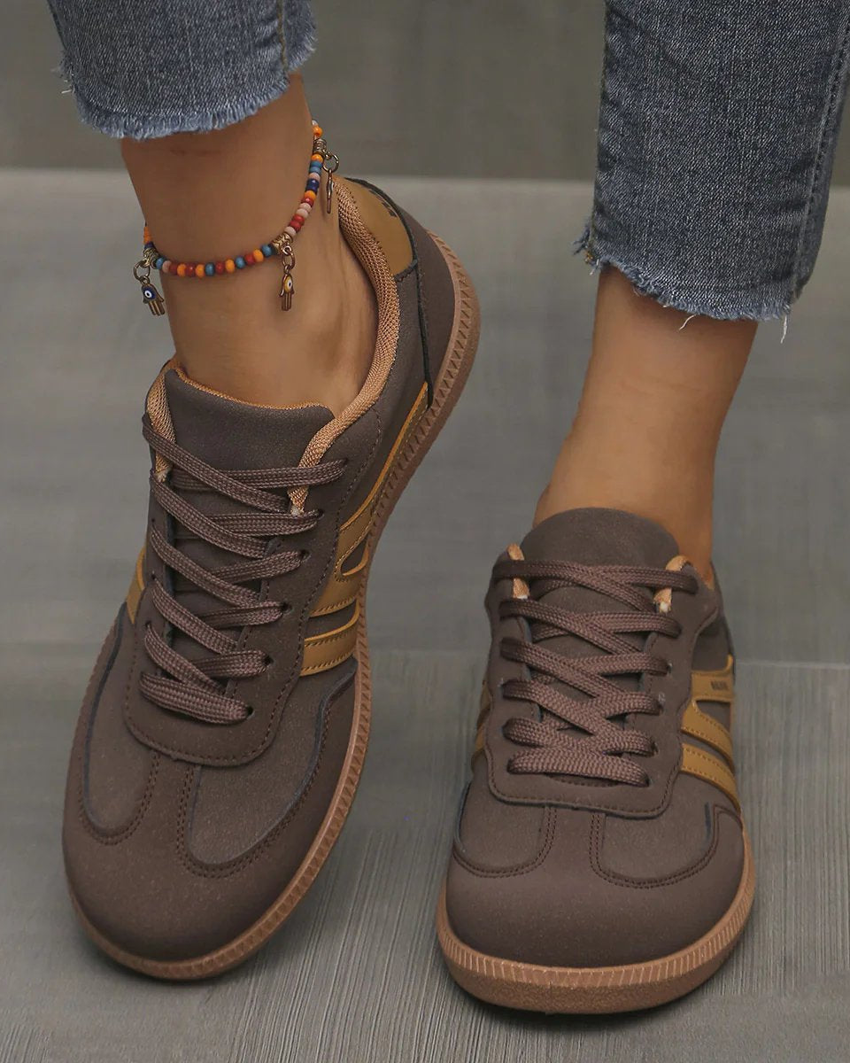 Detailed view of the leopard print Elara orthopaedic cushioned trainer, showing the unique pattern and sole design.