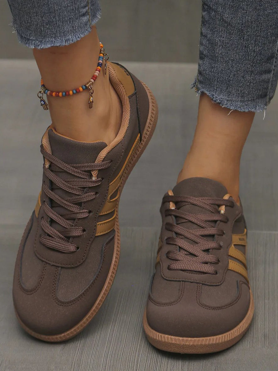 Detailed view of the leopard print Elara orthopaedic cushioned trainer, showing the unique pattern and sole design.