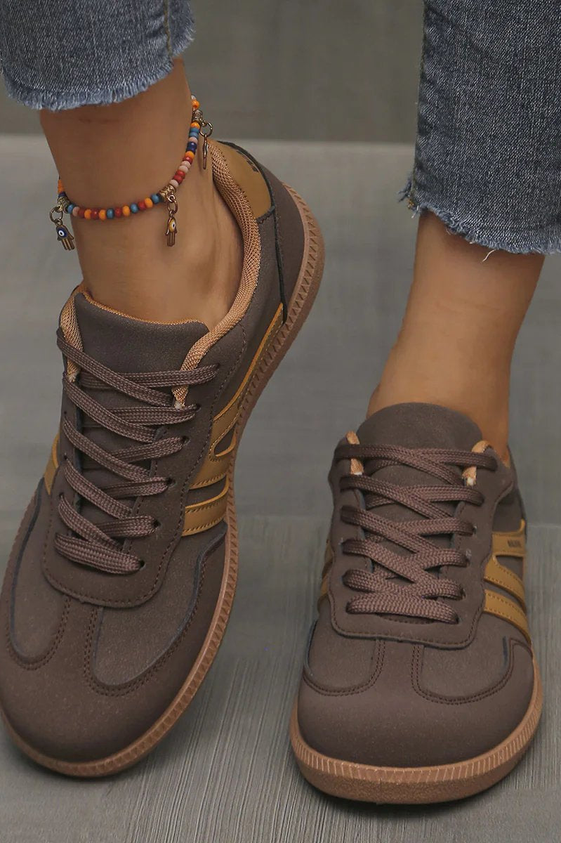 Detailed view of the leopard print Elara orthopaedic cushioned trainer, showing the unique pattern and sole design.