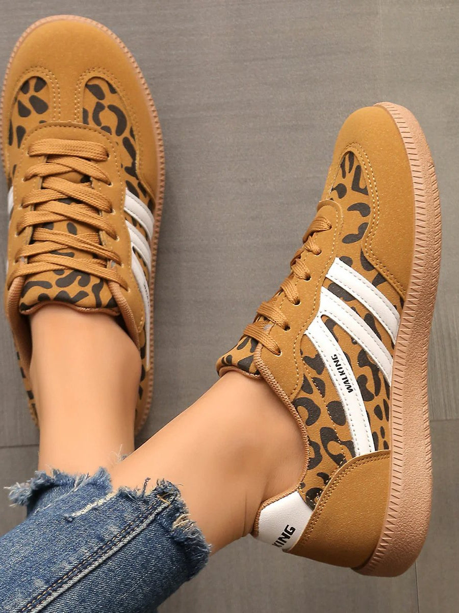 Pair of brown Elara orthopaedic cushioned trainers, presented from above, emphasizing their warm color and stylish versatility.