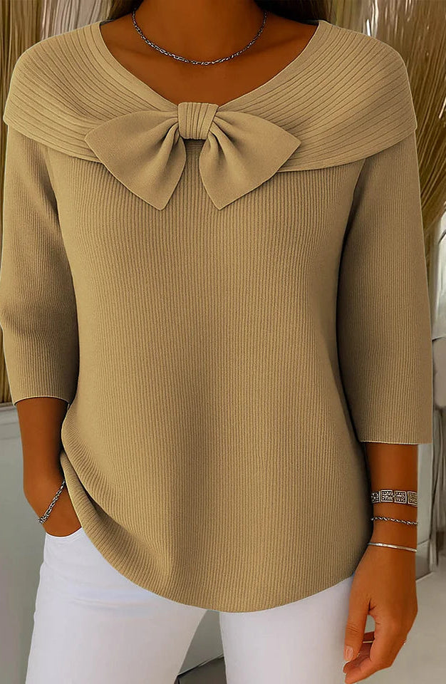 Side profile of a model wearing the pink elegant knitted top, demonstrating the comfortable and stylish fit.