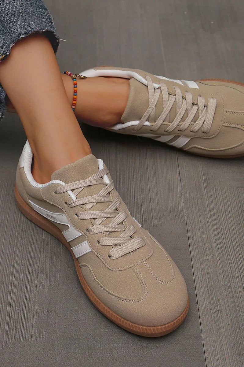 Top-down perspective of the off-white Elara orthopaedic cushioned trainer, showing the foot opening and interior cushioning.