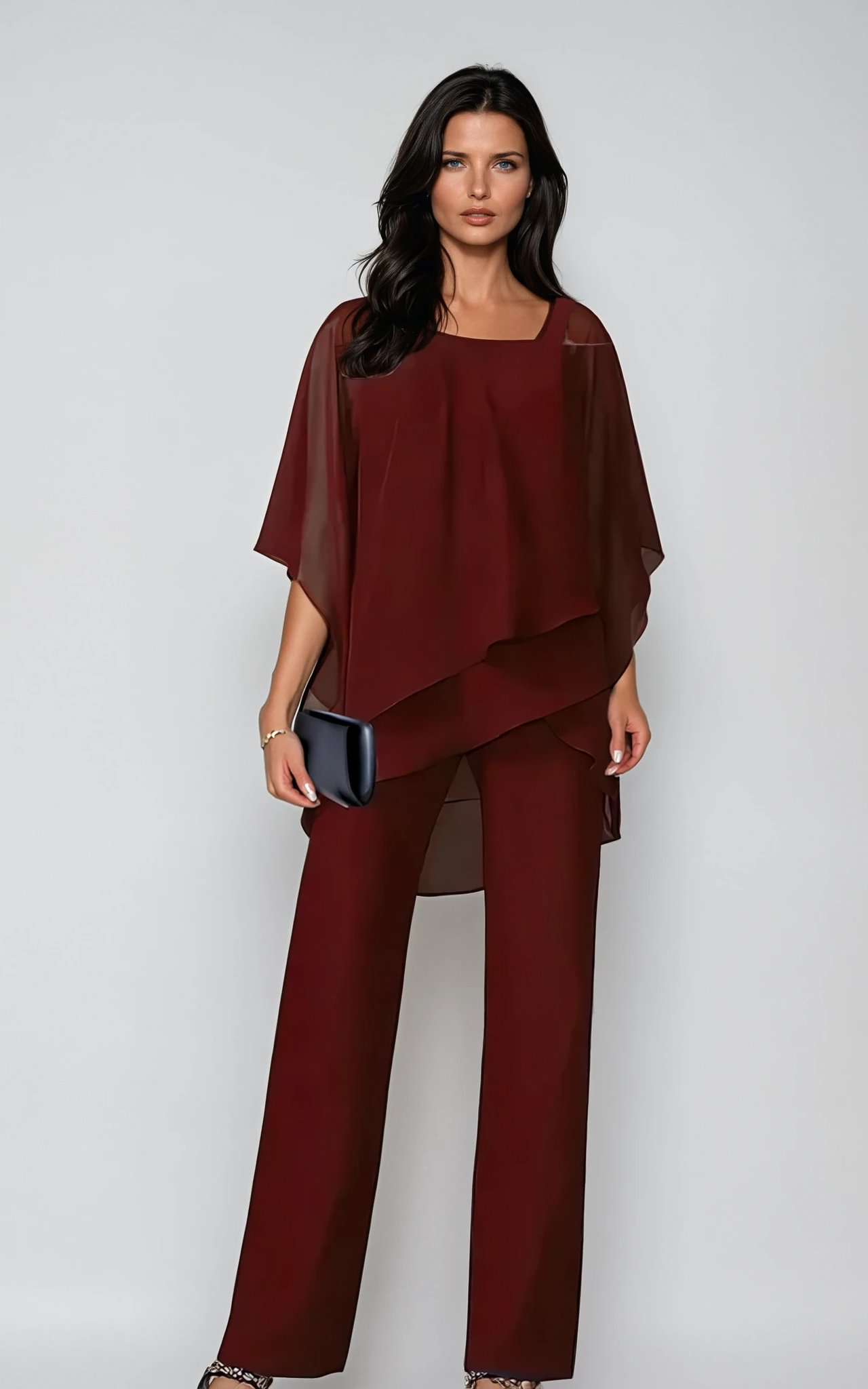 Lifestyle image of the two-piece layered set styled for an evening out, with accessories and soft lighting.