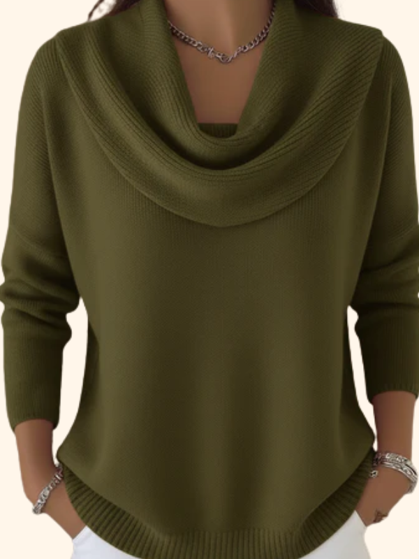 Model wearing Elina comfort fit pants in a vibrant green, styled casually with a white top.