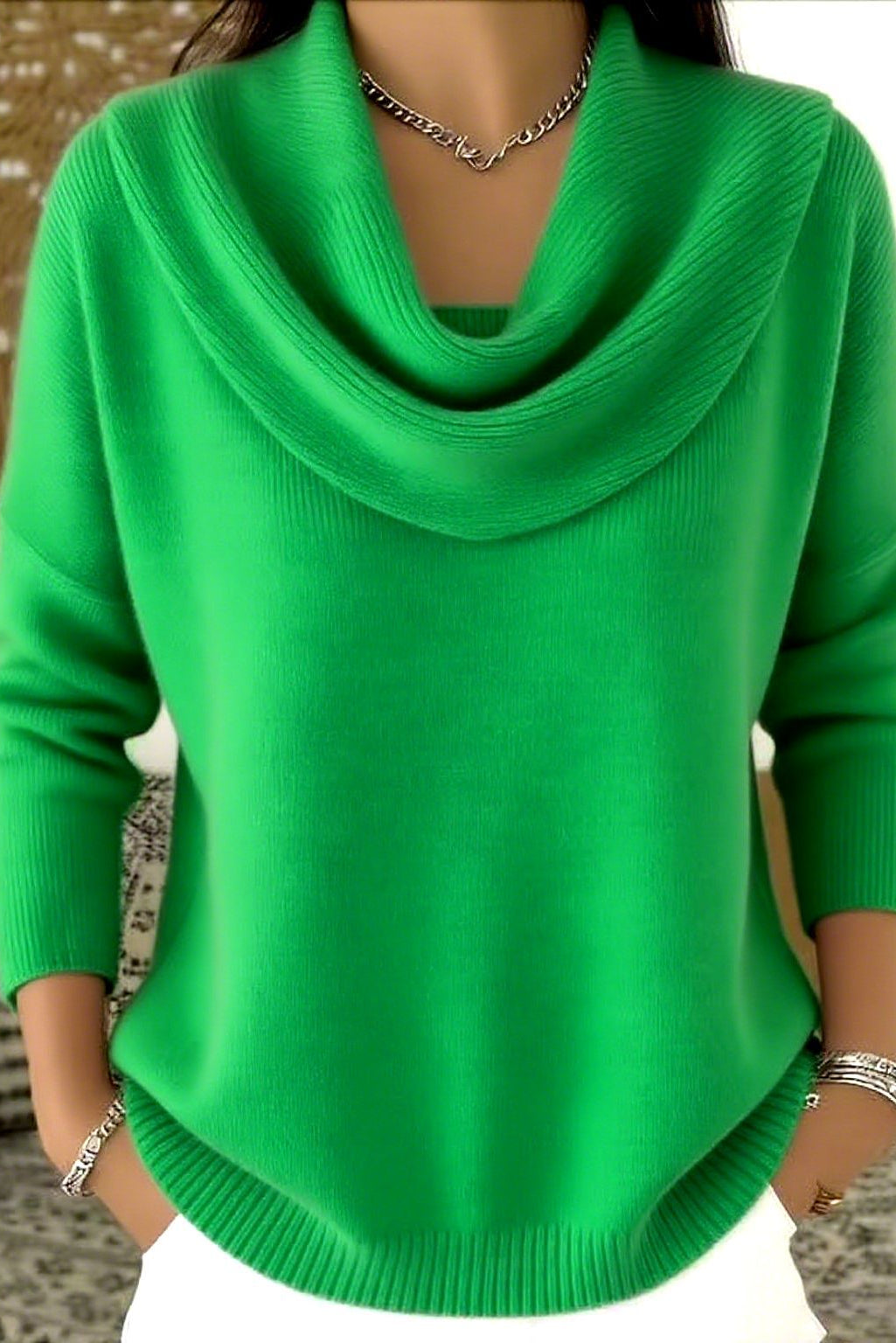 Close-up of the hem and stitching detail on the Elina comfort fit pants in a light green shade.