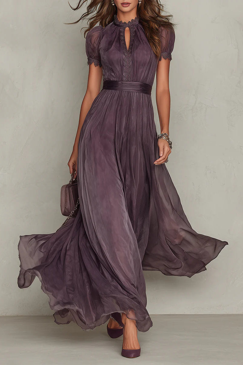Front view of the Evadne purple chiffon lace maxi dress, showcasing the keyhole neckline and flowing skirt.