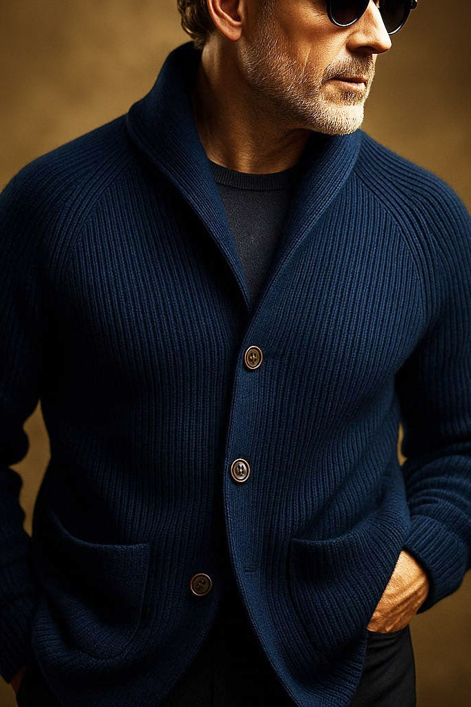 Close-up of the sleeve cuff and hemline of the men's wool blend cardigan, showcasing the detailed finishing.